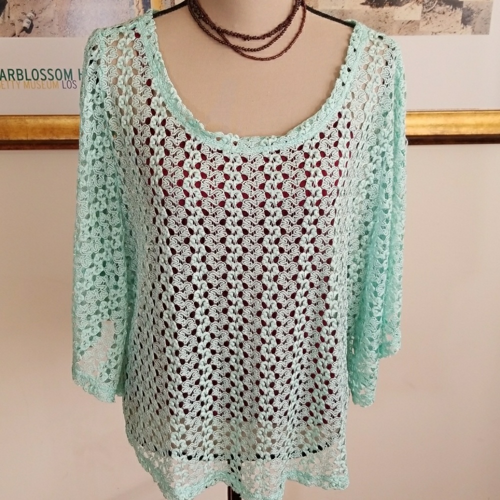 La Mode 22 knitted Green Cape Top.